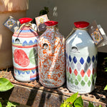 Load image into Gallery viewer, Terre di San Vito Extra Virgin Olive Oil in Hand-Painted Terracotta
